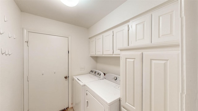 2212 Creekwood Ct, Flower Mound, TX 75028 - laundry area featuring separate washer and dryer and cabinet space