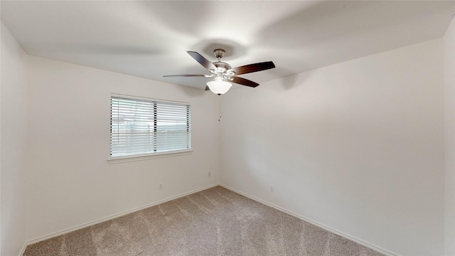 2212 Creekwood Ct, Flower Mound, TX 75028 - empty room featuring a ceiling fan, light carpet, and baseboards
