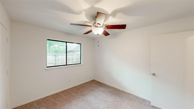 2212 Creekwood Ct, Flower Mound, TX 75028 - unfurnished bedroom with carpet floors, baseboards, and a ceiling fan