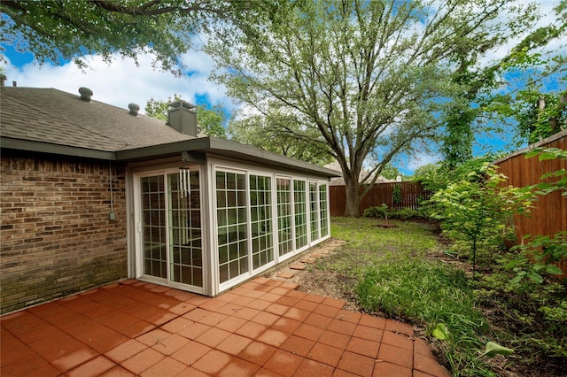 2212 Creekwood Ct, Flower Mound, TX 75028 - fenced backyard with a patio area