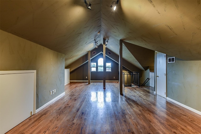 520 N College St, Waxahachie, TX 75165 - additional living space with wood finished floors and lofted ceiling