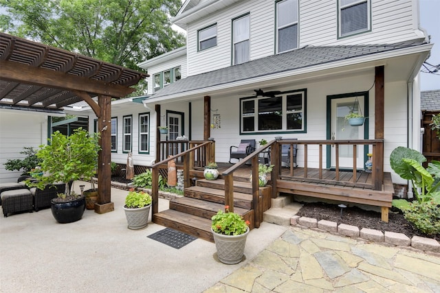520 N College St, Waxahachie, TX 75165 - doorway to property with a porch, a pergola, a shingled roof, and ceiling fan