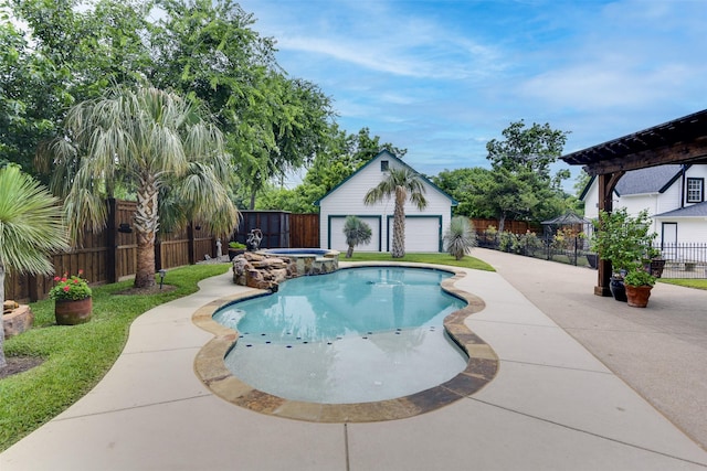 520 N College St, Waxahachie, TX 75165 - view of swimming pool with a fenced backyard, a pool with connected hot tub, and an outbuilding