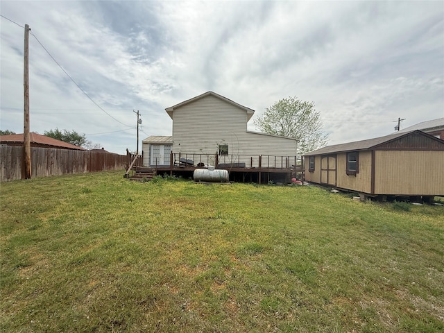 309 E Housley St, Strawn, TX 76475 - back of property featuring a wooden deck