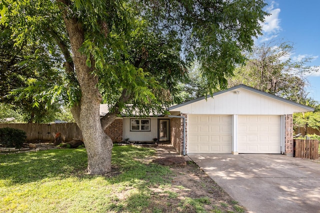 2200 Clover Park Dr, Arlington, TX 76013 - ranch-style house with an attached garage, driveway, and brick siding