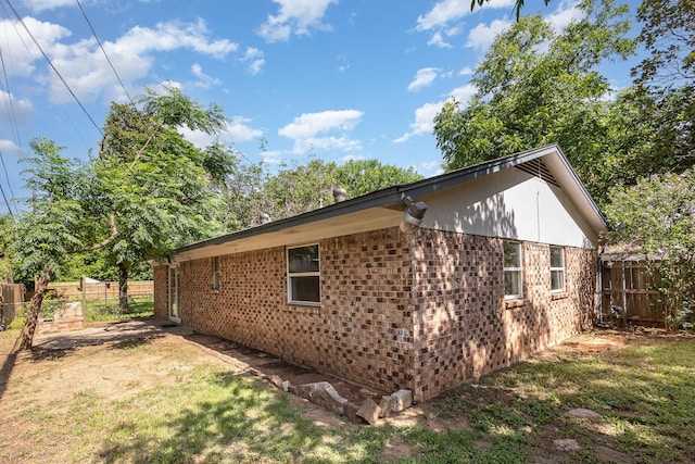 2200 Clover Park Dr, Arlington, TX 76013 - view of side of home featuring brick siding