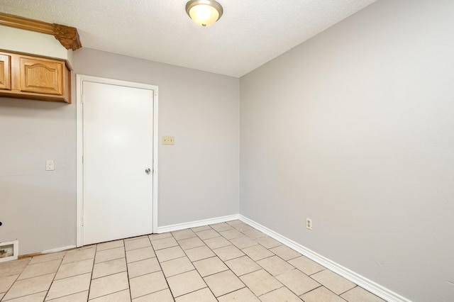 2200 Clover Park Dr, Arlington, TX 76013 - empty room with a textured ceiling and baseboards