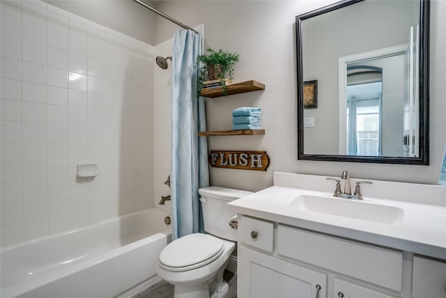 9712 Surveyor Rd, Little Elm, TX 75068 - bathroom featuring shower / bath combo with shower curtain, vanity, toilet, and a textured wall