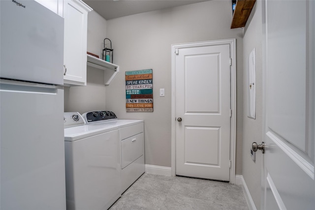 9712 Surveyor Rd, Little Elm, TX 75068 - laundry area with cabinet space, independent washer and dryer, baseboards, and light tile patterned floors