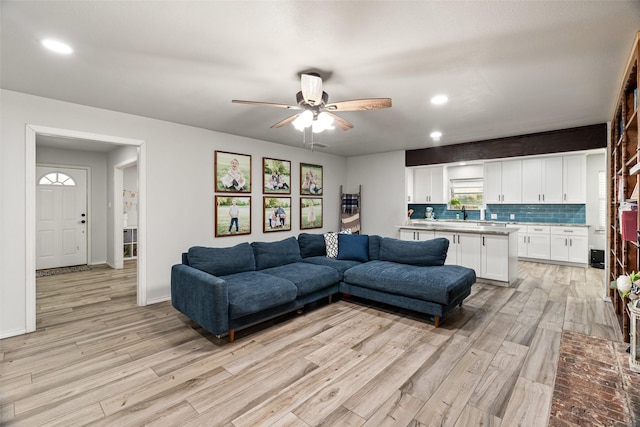 7251 Valley Dale Ct, Benbrook, TX 76116 - living area featuring light wood finished floors, a ceiling fan, and recessed lighting