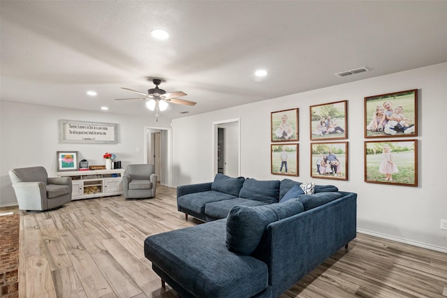 7251 Valley Dale Ct, Benbrook, TX 76116 - living room featuring light wood-style floors, ceiling fan, and recessed lighting