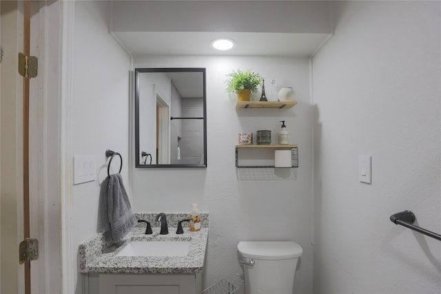 7251 Valley Dale Ct, Benbrook, TX 76116 - bathroom featuring vanity and toilet