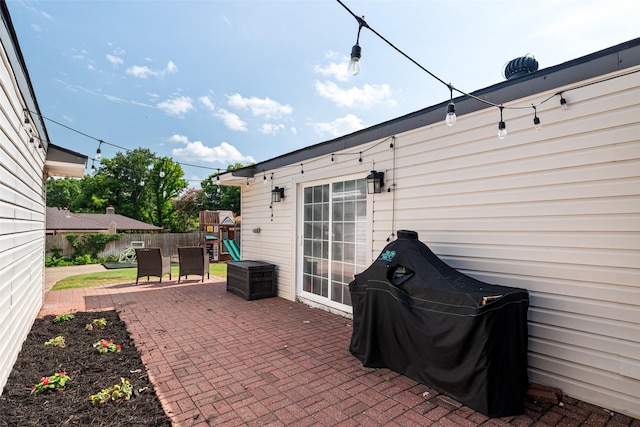 7251 Valley Dale Ct, Benbrook, TX 76116 - view of patio with a playground and a grill