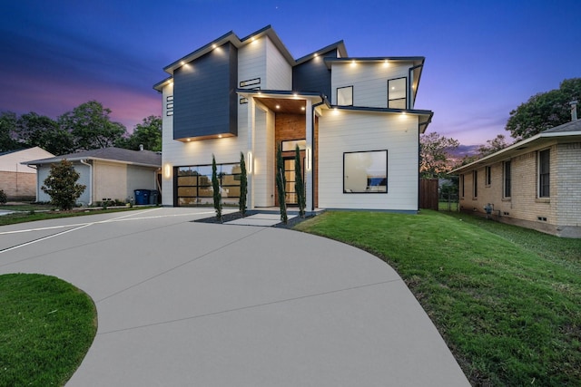 4233 Skillman St, Dallas, TX 75206 - modern home with concrete driveway and a garage