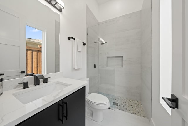 4233 Skillman St, Dallas, TX 75206 - bathroom featuring toilet, vanity, and a stall shower