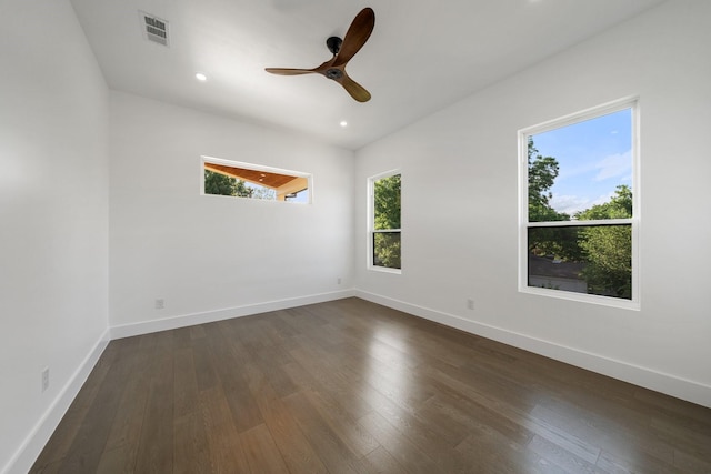 4233 Skillman St, Dallas, TX 75206 - unfurnished room featuring healthy amount of natural light, dark wood finished floors, ceiling fan, and recessed lighting