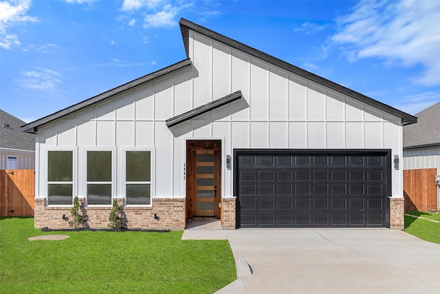 5845 Black Pine Cir, Granbury, TX 76048 - view of front of property featuring brick siding, concrete driveway, board and batten siding, and an attached garage