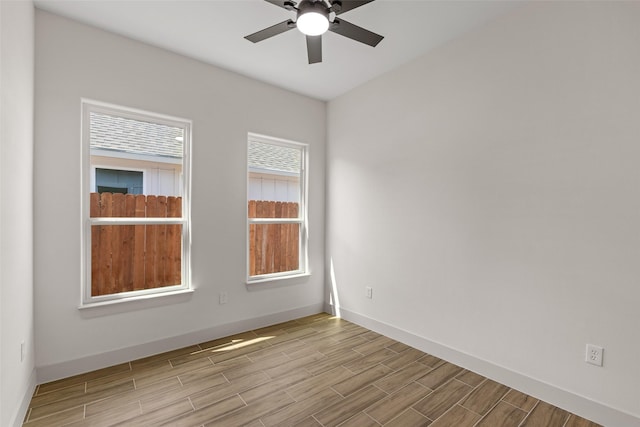 5845 Black Pine Cir, Granbury, TX 76048 - empty room with a ceiling fan, baseboards, and wood finished floors