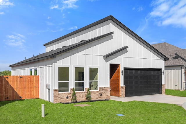 5845 Black Pine Cir, Granbury, TX 76048 - view of front of home with a garage, brick siding, concrete driveway, board and batten siding, and roof with shingles