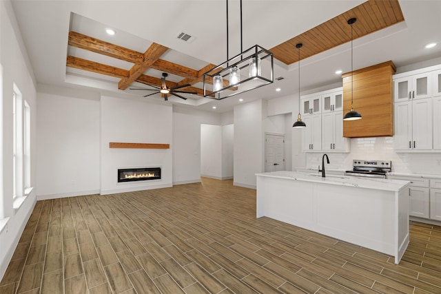 5845 Black Pine Cir, Granbury, TX 76048 - kitchen featuring stainless steel range with electric cooktop, coffered ceiling, a ceiling fan, a sink, and recessed lighting