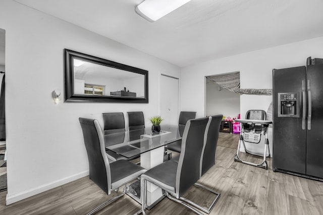 2605 Himes St, Irving, TX 75060 - dining area with wood finished floors and baseboards