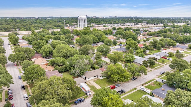 2605 Himes St, Irving, TX 75060 - aerial view of residential area featuring a tree filled landscape