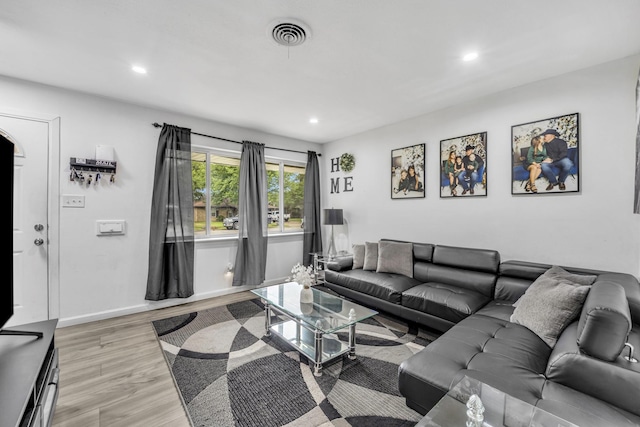 2605 Himes St, Irving, TX 75060 - living room featuring recessed lighting, light wood-style flooring, and baseboards