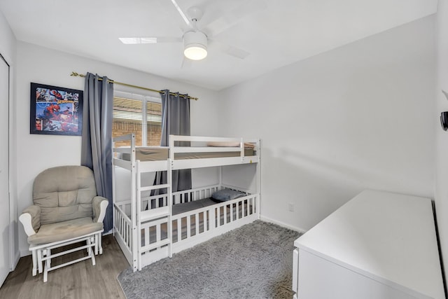 2605 Himes St, Irving, TX 75060 - bedroom with wood finished floors and a ceiling fan