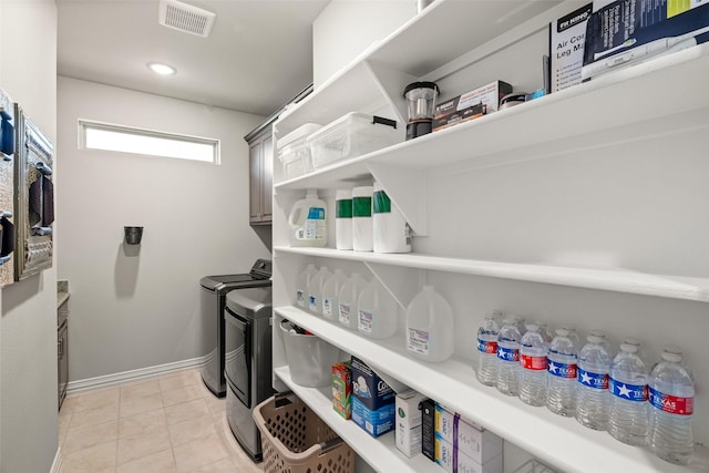 7700 Cerrito Trl, Fort Worth, TX 76123 - washroom featuring cabinet space, separate washer and dryer, baseboards, and recessed lighting