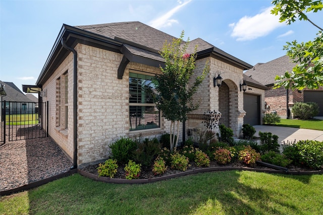 7700 Cerrito Trl, Fort Worth, TX 76123 - view of front of home featuring an attached garage, driveway, stone siding, and brick siding