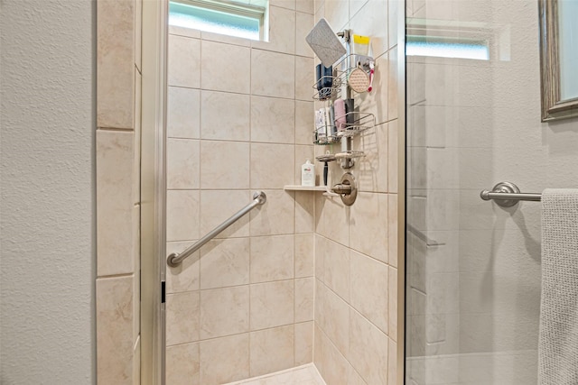 7700 Cerrito Trl, Fort Worth, TX 76123 - full bath featuring a shower stall and a textured wall