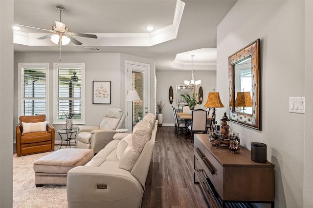 7700 Cerrito Trl, Fort Worth, TX 76123 - living room featuring a tray ceiling, ceiling fan, ornamental molding, plenty of natural light, and dark wood-style flooring
