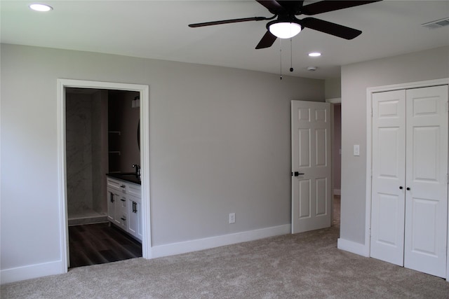 300 Woodhollow Ct, Wylie, TX 75098 - unfurnished bedroom with dark colored carpet, a closet, recessed lighting, ensuite bath, and baseboards
