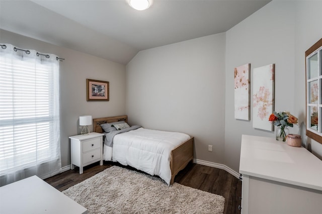 2637 Hillrich Dr, Anna, TX 75409 - bedroom featuring multiple windows, dark wood finished floors, baseboards, and vaulted ceiling