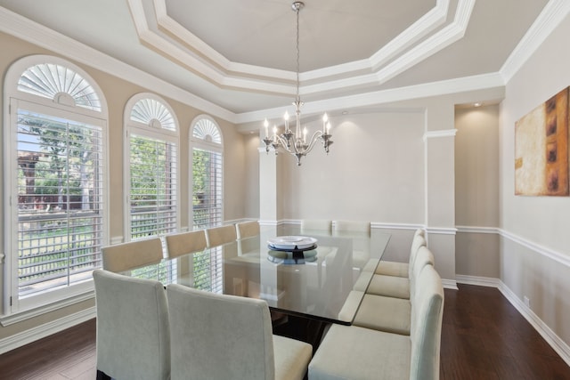 1415 Cambridge Xing, Southlake, TX 76092 - dining area with a chandelier, a tray ceiling, ornamental molding, dark wood finished floors, and baseboards