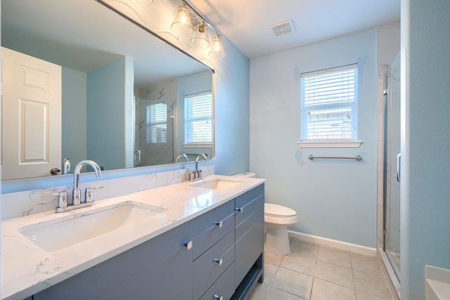 14713 Brandon Dr, Little Elm, TX 75068 - full bathroom with double vanity, a shower stall, and tile patterned floors