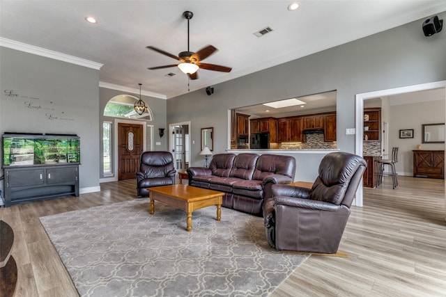 501 Valle Vista Ct, Keller, TX 76248 - living room with crown molding, light wood-style floors, recessed lighting, baseboards, and ceiling fan