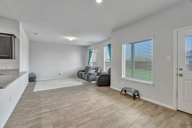 9752 New Bern Dr, Fort Worth, TX 76108 - unfurnished room with light wood finished floors and baseboards