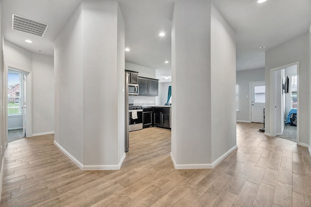 9752 New Bern Dr, Fort Worth, TX 76108 - corridor featuring light wood-style floors, baseboards, and recessed lighting