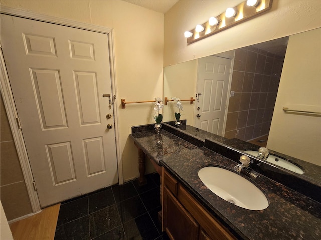 9835 Walnut St Unit 203, Dallas, TX 75243 - bathroom with tile patterned flooring and vanity