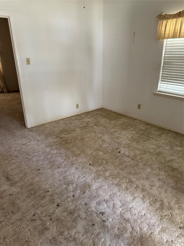 820 Goshen Rd, Springtown, TX 76082 - empty room featuring carpet and baseboards