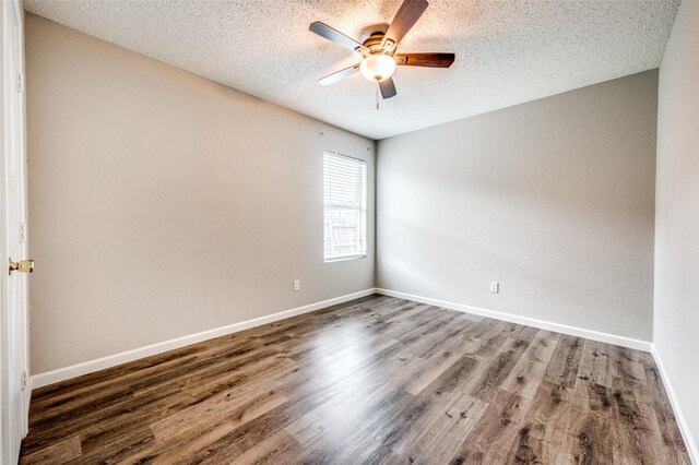 319 Quail Crossing Dr, Sanger, TX 76266 - empty room with a ceiling fan, a textured ceiling, wood finished floors, and baseboards