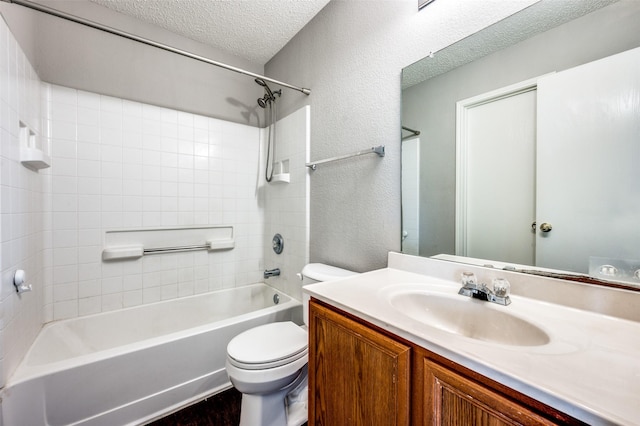 319 Quail Crossing Dr, Sanger, TX 76266 - full bath with vanity, shower / bath combination, toilet, a textured ceiling, and a textured wall
