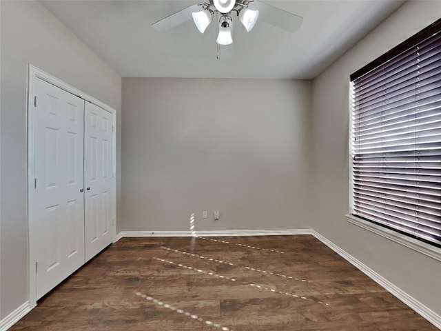 1104 Cactus Spine Dr, Fort Worth, TX 76052 - unfurnished bedroom with wood finished floors, baseboards, a closet, and a ceiling fan