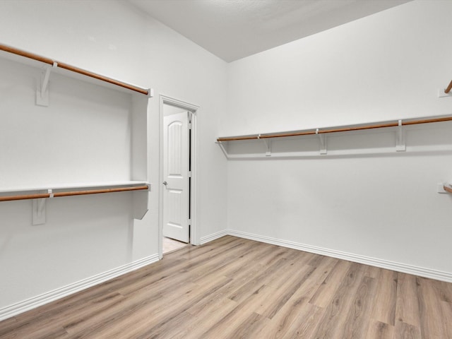 125 Gill Point Ln, Aledo, TX 76008 - spacious closet featuring wood finished floors
