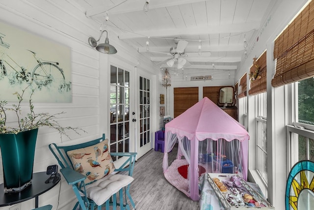 6440 Harmonson Rd, North Richland Hills, TX 76180 - sunroom / solarium featuring french doors, ceiling fan, and beamed ceiling