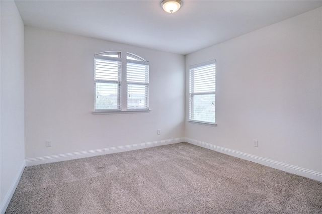8721 Maple Ridge Rd, Fort Worth, TX 76244 - empty room featuring light carpet and baseboards