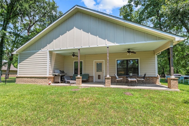 103 Idlewood Rd, Enchanted Oaks, TX 75156 - back of property featuring ceiling fan, a patio, and brick siding