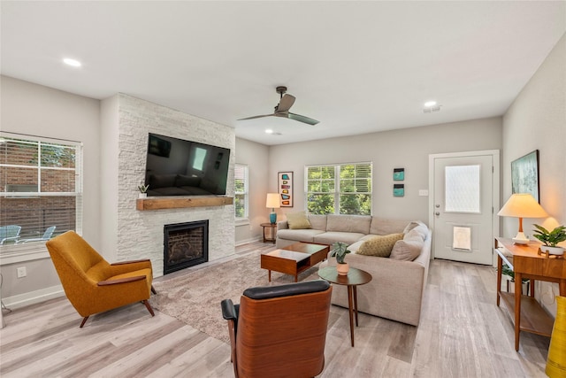 103 Idlewood Rd, Enchanted Oaks, TX 75156 - living room featuring light wood-type flooring, a fireplace, a ceiling fan, recessed lighting, and baseboards