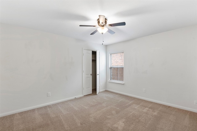 2118 Cone Flower Dr, Forney, TX 75126 - spare room featuring ceiling fan, light carpet, and baseboards